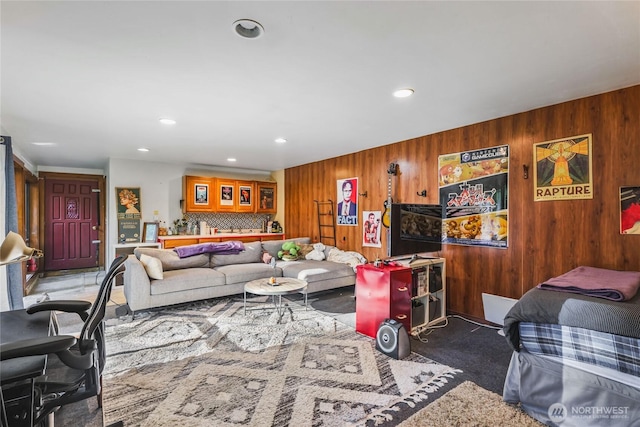 5617 236th Ave NE, Redmond, WA 98053 - carpeted living room with wooden walls, bar area, and recessed lighting