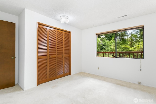 13219 SE 52nd Pl, Bellevue, WA 98006 - unfurnished bedroom with carpet floors and a closet