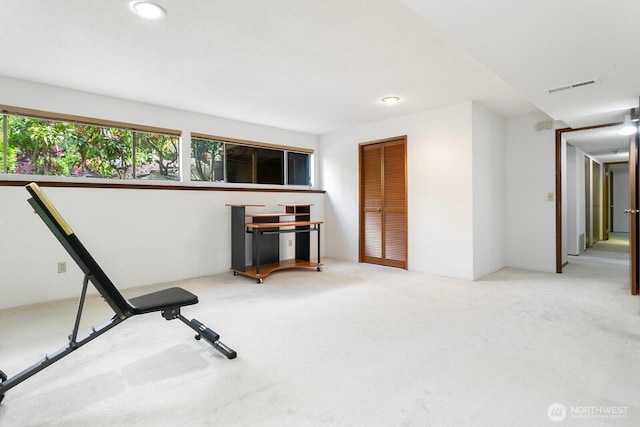 13219 SE 52nd Pl, Bellevue, WA 98006 - exercise room featuring carpet flooring and recessed lighting