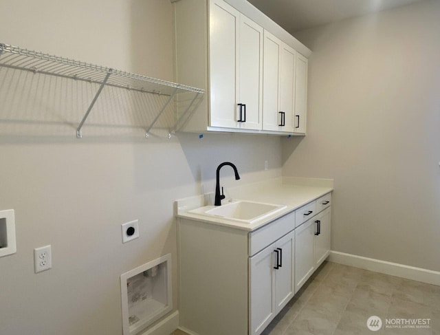 2532 Acer Loop SE, Lacey, WA 98513 - laundry area with hookup for an electric dryer, cabinet space, baseboards, and hookup for a washing machine