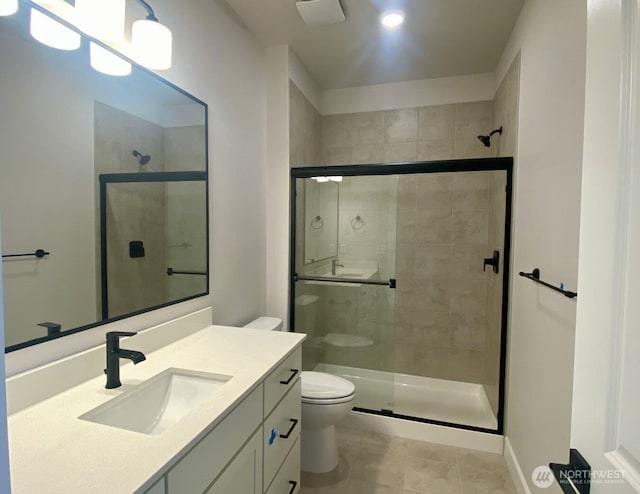 2532 Acer Loop SE, Lacey, WA 98513 - full bathroom featuring toilet, vanity, a shower stall, and tile patterned flooring