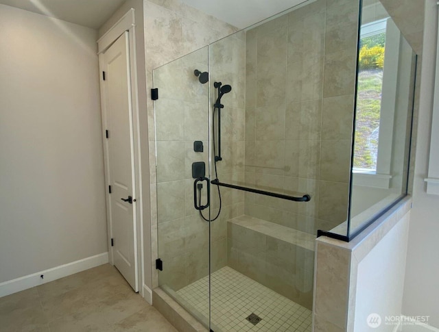 2532 Acer Loop SE, Lacey, WA 98513 - bathroom featuring a stall shower, baseboards, plenty of natural light, and tile patterned flooring