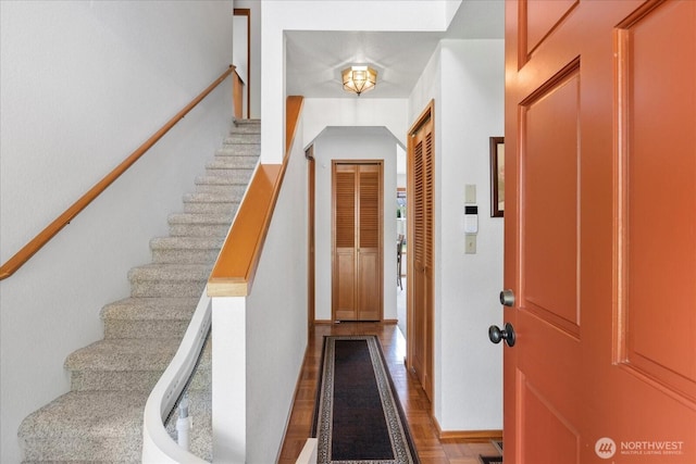 4920 90th Pl SW, Mukilteo, WA 98275 - foyer featuring stairs, wood finished floors, and baseboards