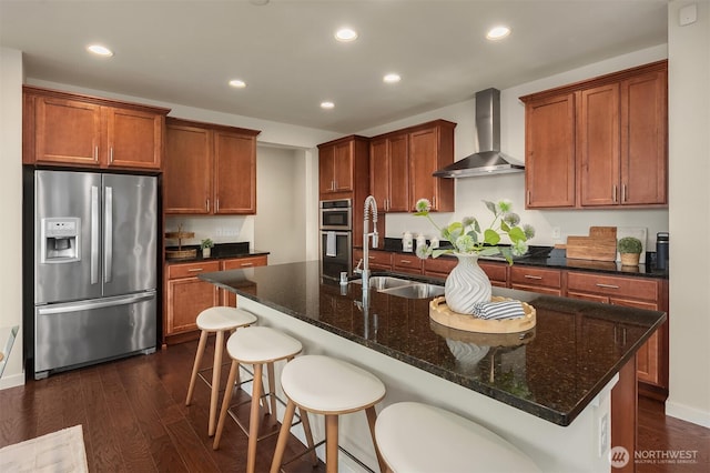 28616 NE 155th St, Duvall, WA 98019 - kitchen featuring stainless steel appliances, wall chimney range hood, a sink, dark wood finished floors, and recessed lighting