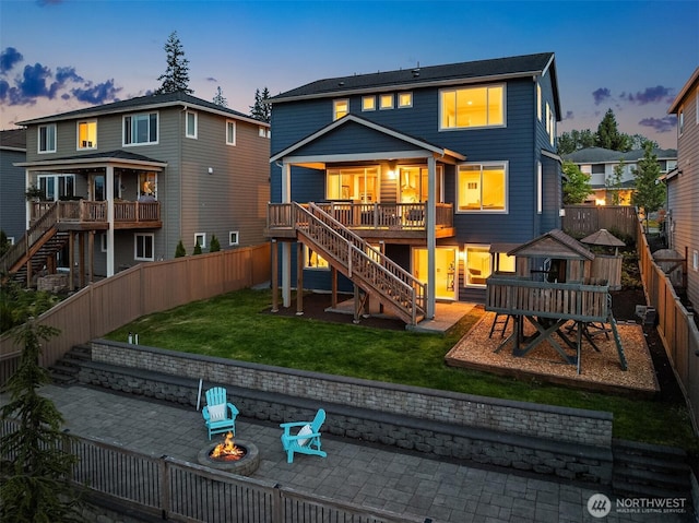 28616 NE 155th St, Duvall, WA 98019 - rear view of property with stairway, an outdoor fire pit, a patio area, and a deck