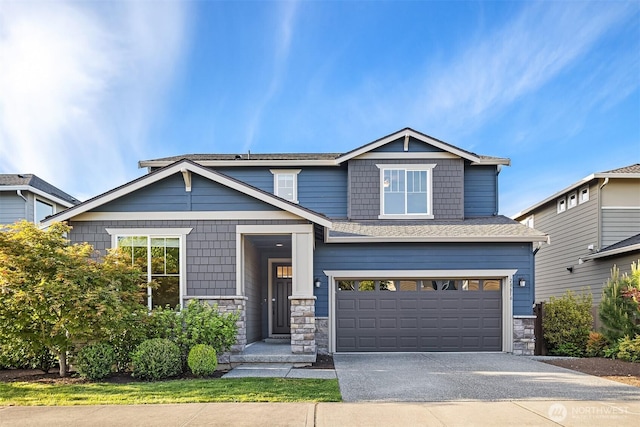 28616 NE 155th St, Duvall, WA 98019 - craftsman inspired home featuring stone siding, an attached garage, and driveway