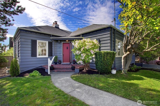 1635 46th Ave SW, Seattle, WA 98116 - bungalow with a front lawn, a chimney, and a shingled roof