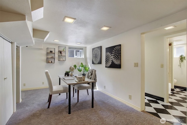 1635 46th Ave SW, Seattle, WA 98116 - dining area featuring healthy amount of natural light, baseboards, carpet flooring, and a textured ceiling