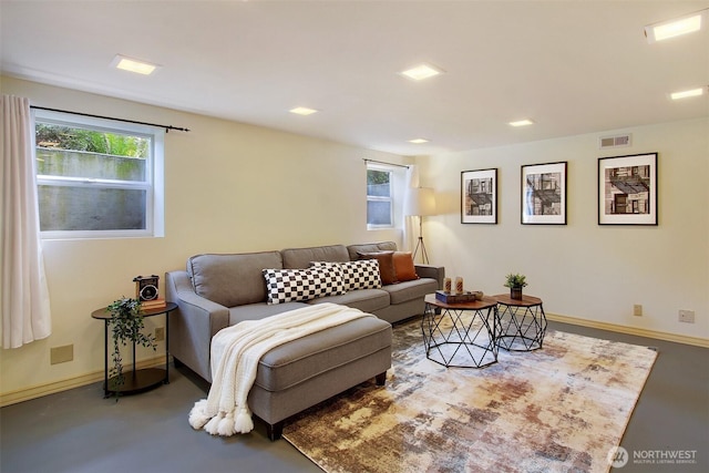 1635 46th Ave SW, Seattle, WA 98116 - living room featuring plenty of natural light and baseboards