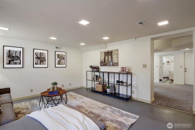 1635 46th Ave SW, Seattle, WA 98116 - living area with baseboards and concrete floors