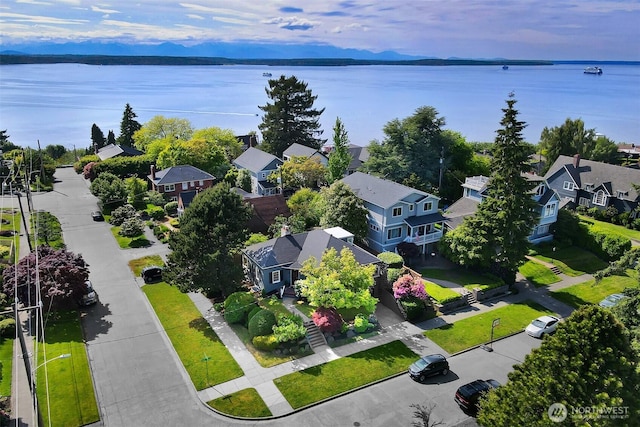 1635 46th Ave SW, Seattle, WA 98116 - aerial perspective of suburban area featuring a large body of water