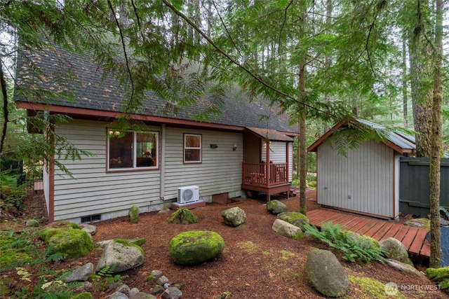 7480 Glacier Springs Dr, Deming, WA 98244 - view of front of house featuring a deck, a cooling unit, and roof with shingles