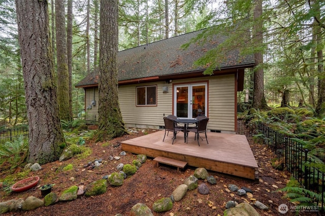 7480 Glacier Springs Dr, Deming, WA 98244 - back of property featuring a deck, roof with shingles, and outdoor dining space