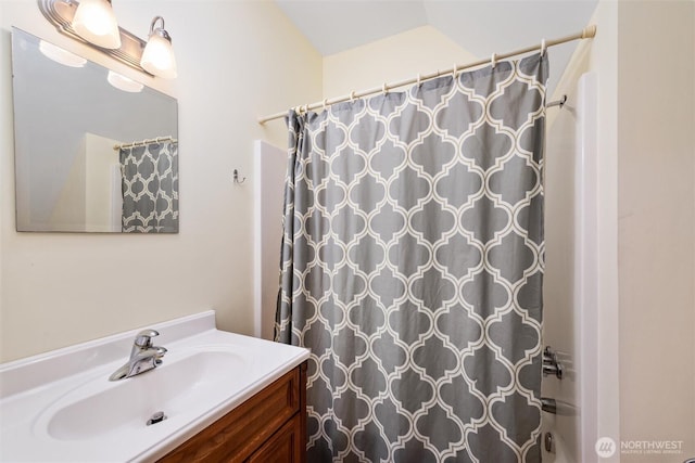 7480 Glacier Springs Dr, Deming, WA 98244 - full bathroom with vanity, a shower with curtain, and vaulted ceiling