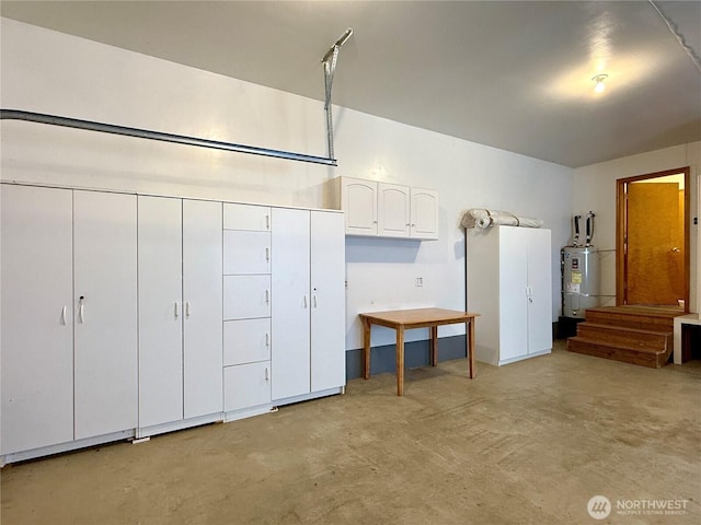 374 Harbor View Loop SE, Ocean Shores, WA 98569 - garage featuring water heater