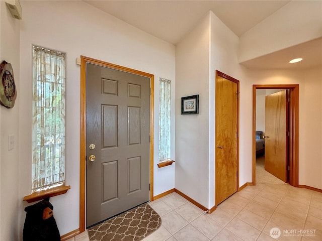 374 Harbor View Loop SE, Ocean Shores, WA 98569 - entrance foyer with baseboards and light tile patterned floors