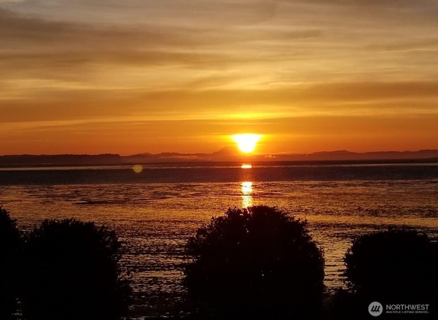 374 Harbor View Loop SE, Ocean Shores, WA 98569 - water view featuring mountains