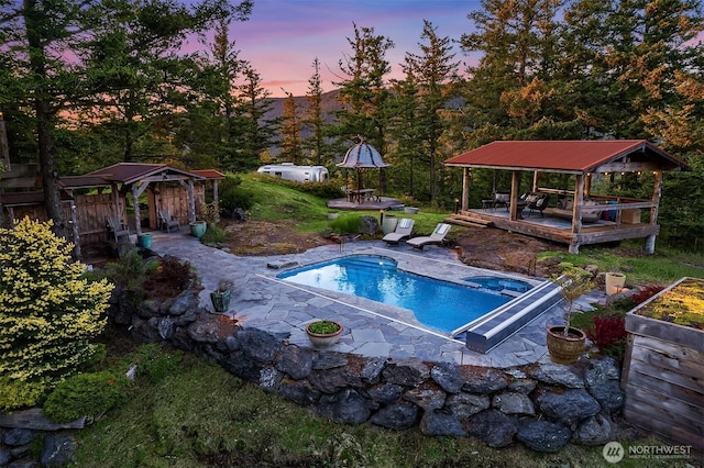 354 Nighthawk Ln, Orcas Island, WA 98279 - pool at dusk with a gazebo and a patio