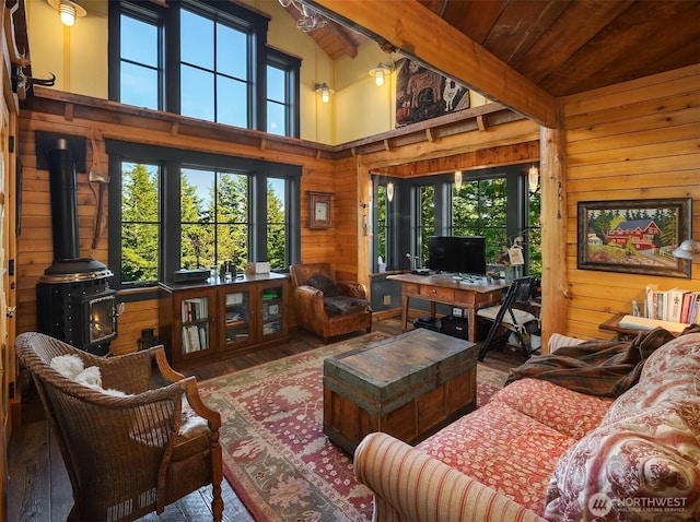 354 Nighthawk Ln, Orcas Island, WA 98279 - living room featuring hardwood / wood-style floors, wooden walls, wood ceiling with exposed beams, a wood stove, and high vaulted ceiling