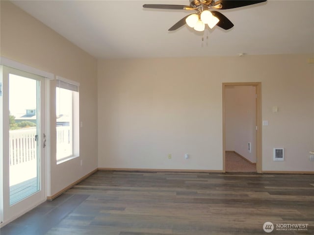 1080 Greenview Ct SW, Ocean Shores, WA 98569 - spare room featuring wood finished floors, a ceiling fan, and baseboards