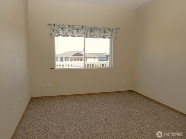 1080 Greenview Ct SW, Ocean Shores, WA 98569 - carpeted spare room with healthy amount of natural light and baseboards