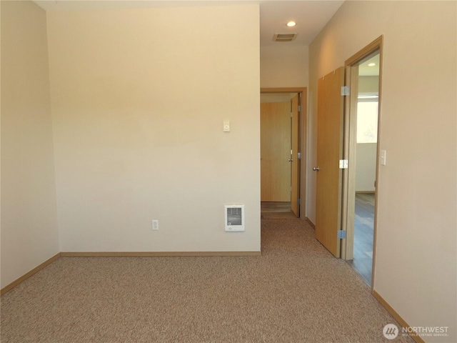 1080 Greenview Ct SW, Ocean Shores, WA 98569 - unfurnished room featuring carpet flooring, baseboards, recessed lighting, and heating unit