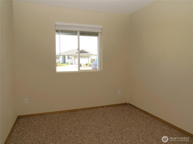 1080 Greenview Ct SW, Ocean Shores, WA 98569 - spare room featuring carpet and baseboards
