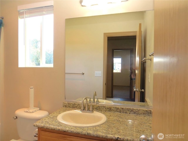 1080 Greenview Ct SW, Ocean Shores, WA 98569 - half bathroom featuring vanity and toilet