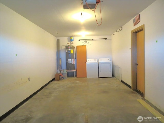 1080 Greenview Ct SW, Ocean Shores, WA 98569 - garage with separate washer and dryer, electric water heater, a garage door opener, and baseboards