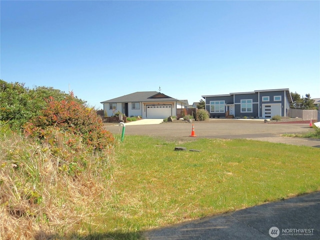 1080 Greenview Ct SW, Ocean Shores, WA 98569 - view of front of property with driveway and an attached garage
