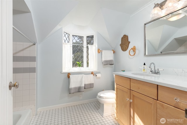 1701 W Yakima Ave, Yakima, WA 98902 - bathroom with vanity, toilet, baseboards, bathtub / shower combination, and tile patterned floors