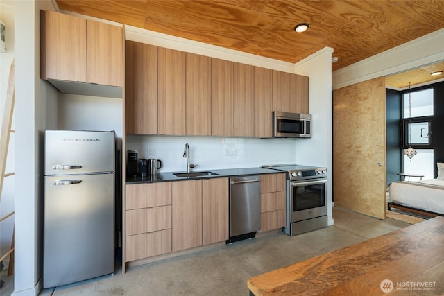 23692 Cliffe Pointe Rd NW Unit 6B, Quincy, WA 98848 - kitchen with stainless steel appliances, a sink, modern cabinets, and dark countertops