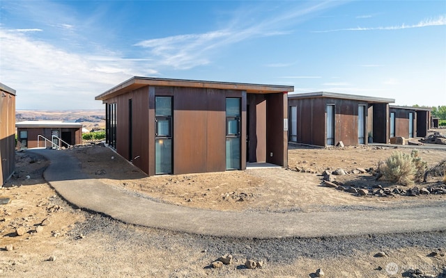 23692 Cliffe Pointe Rd NW Unit 6B, Quincy, WA 98848 - view of front facade featuring an outbuilding