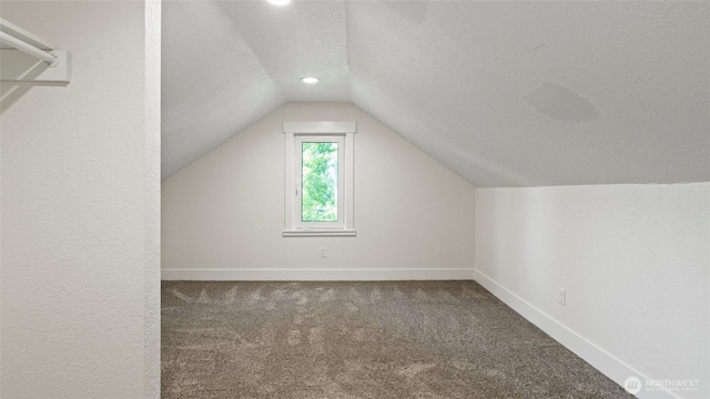 215 E Oak St, Walla Walla, WA 99362 - bonus room with lofted ceiling, carpet, a textured ceiling, baseboards, and recessed lighting