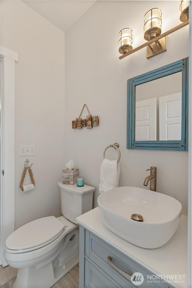 1438 Ocean Crest Ave SW, Ocean Shores, WA 98569 - bathroom featuring vanity and toilet