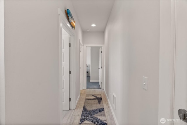1438 Ocean Crest Ave SW, Ocean Shores, WA 98569 - hall with recessed lighting, baseboards, and light wood-style floors