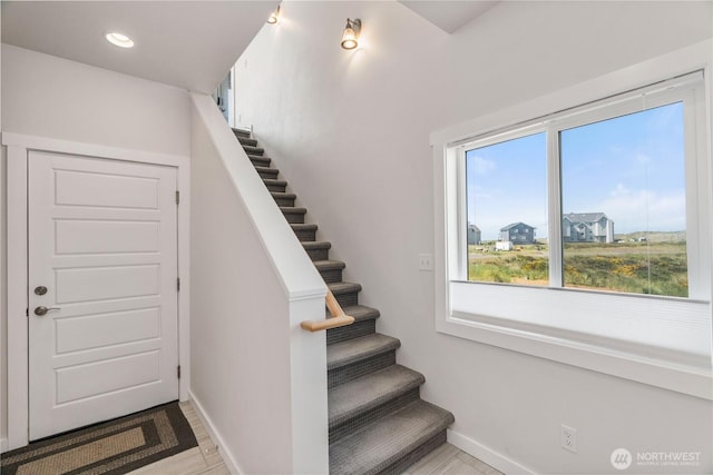 1438 Ocean Crest Ave SW, Ocean Shores, WA 98569 - stairway featuring baseboards, wood finished floors, and recessed lighting