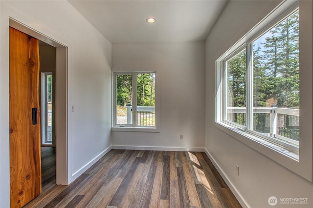 16 Village View Rd, Orcas Island, WA 98245 - empty room with plenty of natural light, dark wood finished floors, baseboards, and recessed lighting