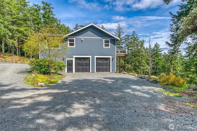 16 Village View Rd, Orcas Island, WA 98245 - view of home's exterior featuring driveway and an attached garage