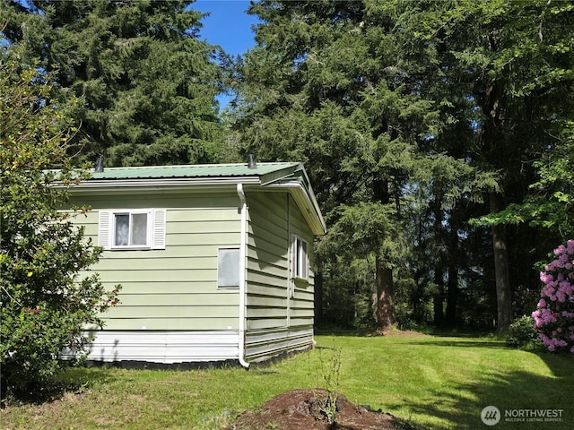 14721 Morris Rd Unit 21, Randle, WA 98377 - view of side of home with a yard and metal roof