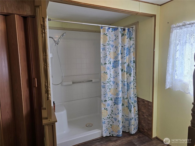 14721 Morris Rd Unit 21, Randle, WA 98377 - bathroom featuring a shower with curtain and wood finished floors