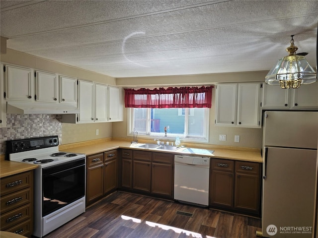 14721 Morris Rd Unit 21, Randle, WA 98377 - kitchen with dishwasher, freestanding refrigerator, electric stove, under cabinet range hood, and a sink