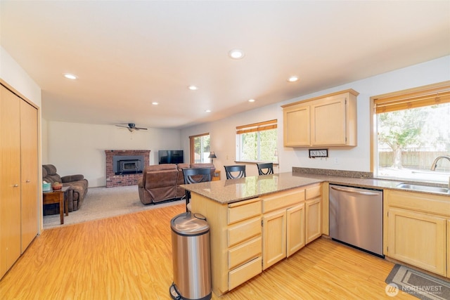 14415 144th St E, Orting, WA 98360 - kitchen featuring dishwasher, light brown cabinets, a sink, and recessed lighting