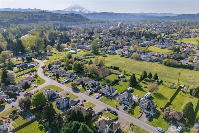 14415 144th St E, Orting, WA 98360 - aerial view of property and surrounding area with mountains and nearby suburban area