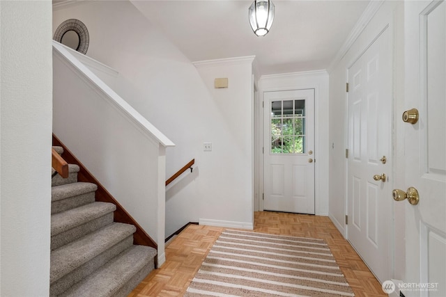 60 E Christmas Tree Pl, Belfair, WA 98528 - foyer entrance with baseboards, stairs, and ornamental molding