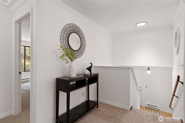 60 E Christmas Tree Pl, Belfair, WA 98528 - corridor featuring an upstairs landing, carpet floors, ornamental molding, baseboard heating, and baseboards