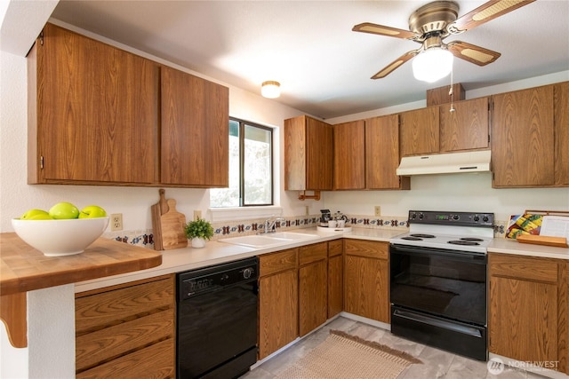60 E Christmas Tree Pl, Belfair, WA 98528 - kitchen with range with electric cooktop, dishwasher, under cabinet range hood, brown cabinets, and ceiling fan