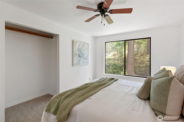 60 E Christmas Tree Pl, Belfair, WA 98528 - bedroom with carpet floors, baseboards, and ceiling fan