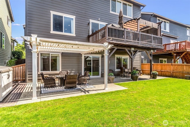 912 77th Dr SE, Lake Stevens, WA 98258 - back of house with a pergola, a patio, and a wooden deck