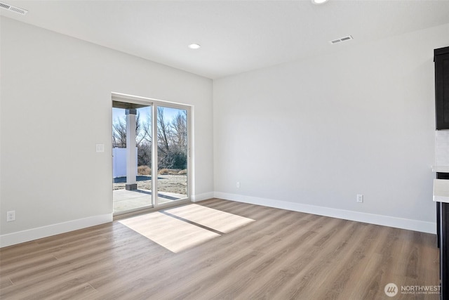 4247 W Sandy Ct, Moses Lake, WA 98837 - empty room featuring wood finished floors, baseboards, and recessed lighting